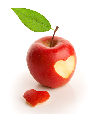 Red apple with cut heart
